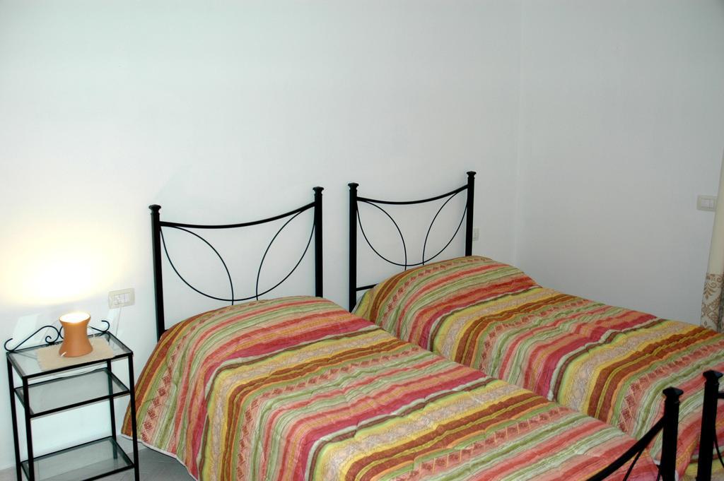 Holiday Homes Stella Marina San Teodoro  Rum bild