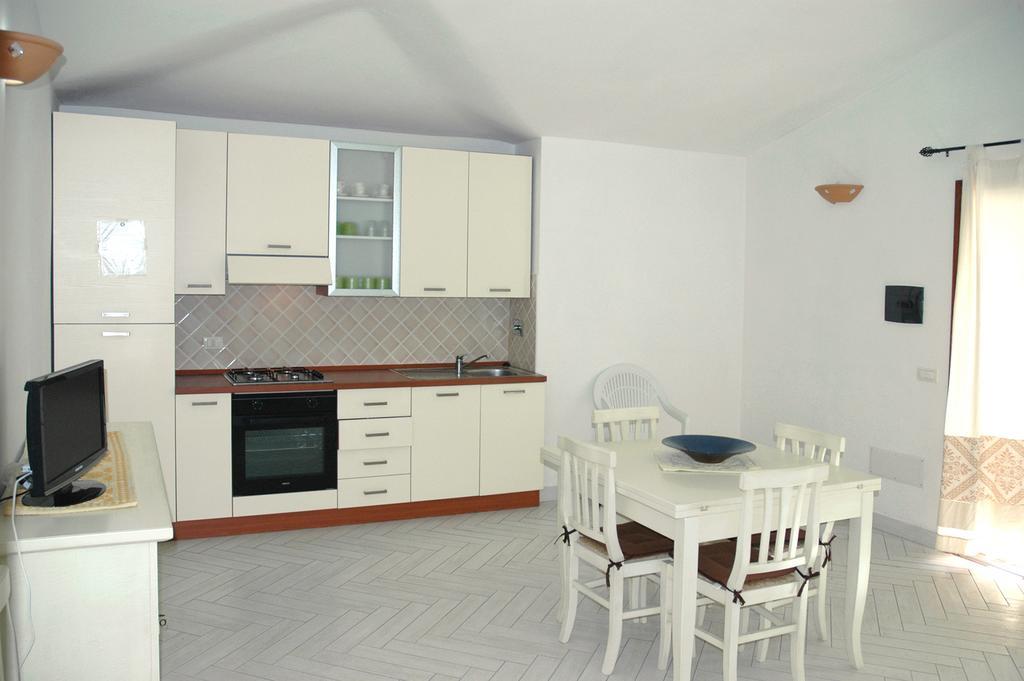 Holiday Homes Stella Marina San Teodoro  Rum bild