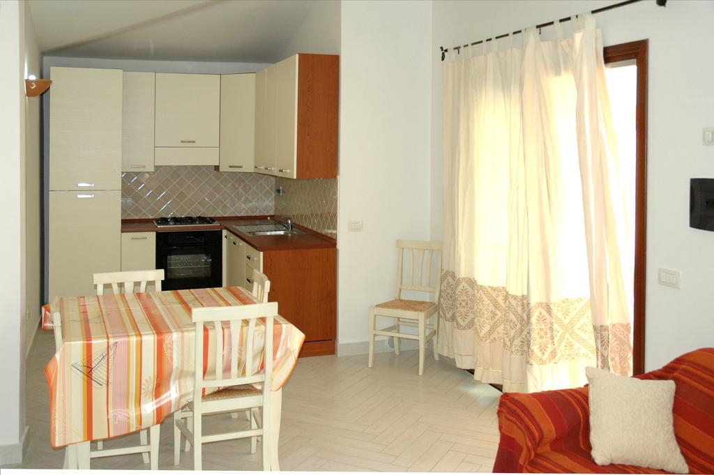 Holiday Homes Stella Marina San Teodoro  Rum bild