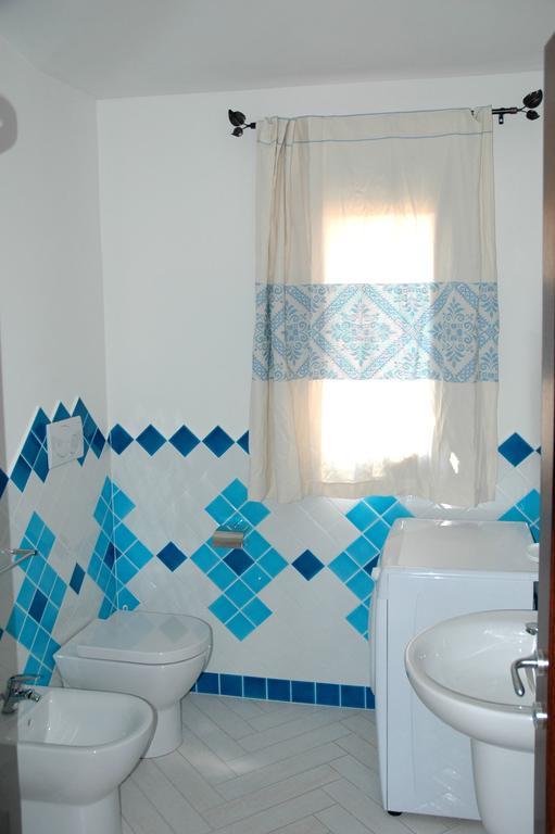 Holiday Homes Stella Marina San Teodoro  Rum bild