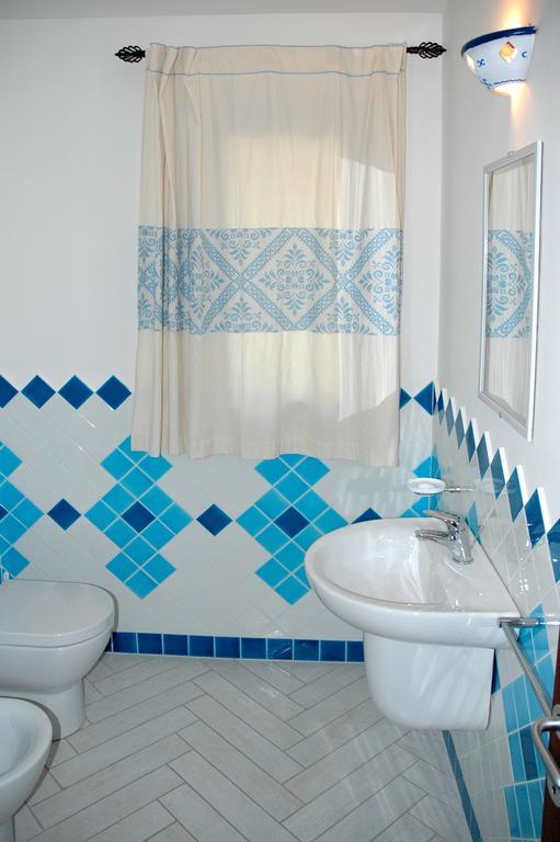 Holiday Homes Stella Marina San Teodoro  Rum bild