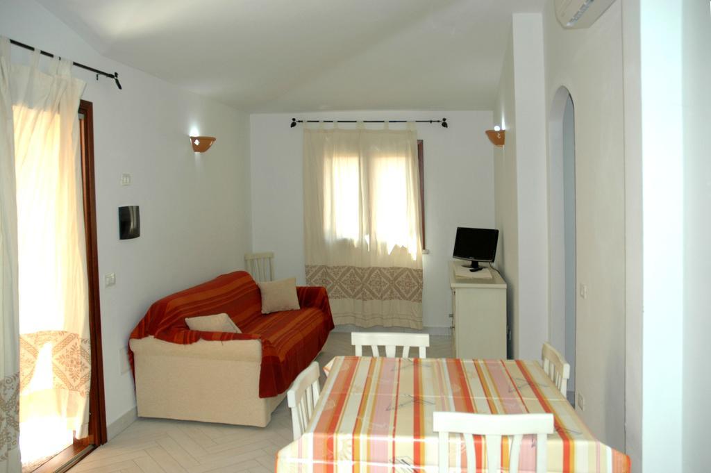 Holiday Homes Stella Marina San Teodoro  Rum bild