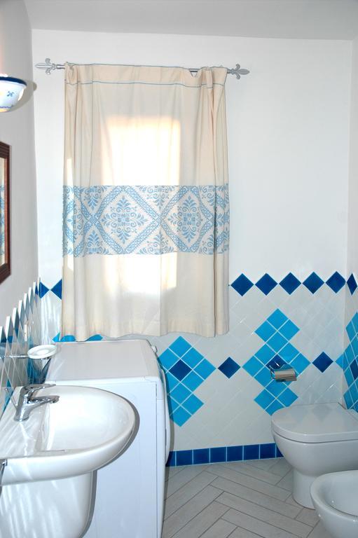 Holiday Homes Stella Marina San Teodoro  Rum bild